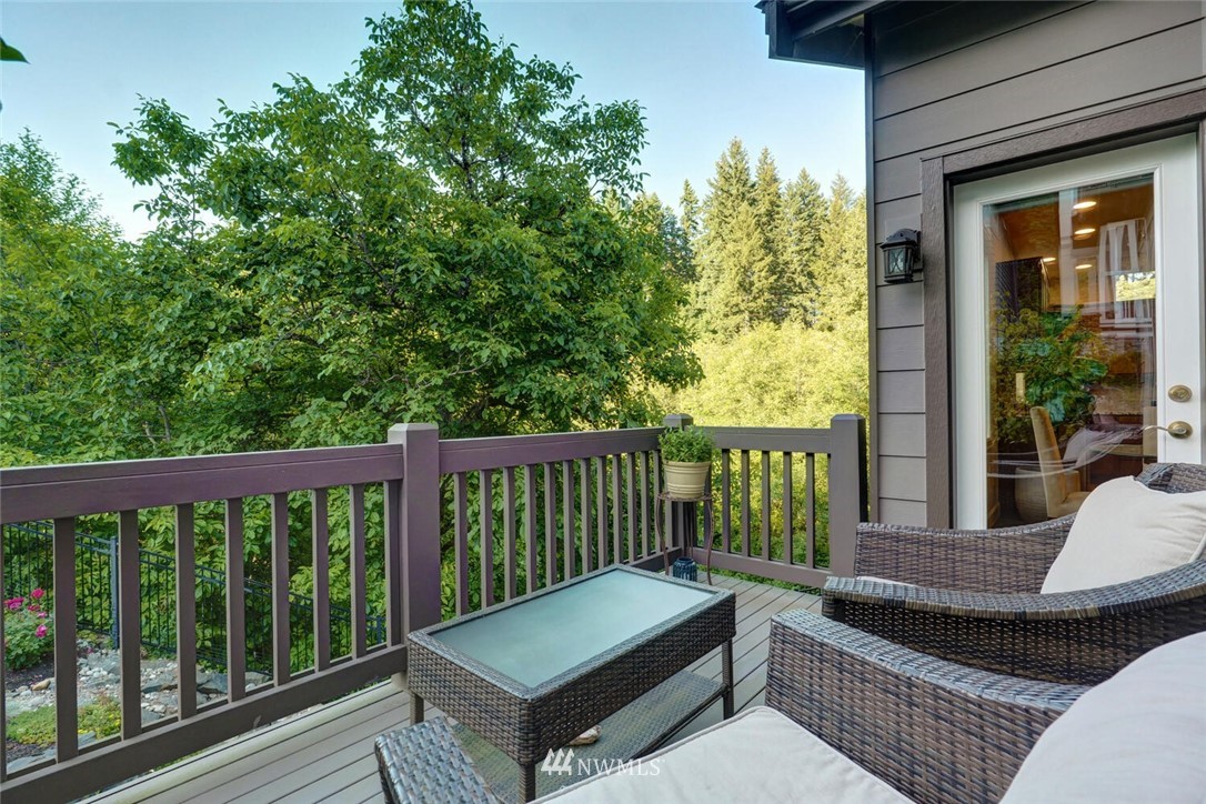 19622 94th Avenue Northeast, Unit 38 Bothell, WA 98011 - Photo 10 of 30 a view of a two chairs in the balcony
