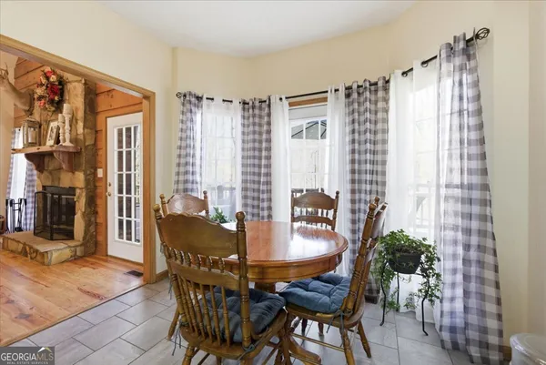 a stove top oven sitting inside of a kitchen