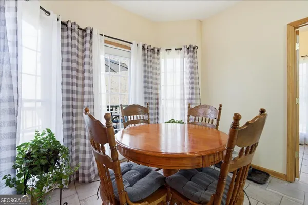 a view of balcony with wooden floor