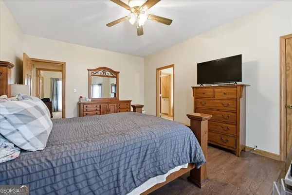 a view of a workspace with a window and lounge chair