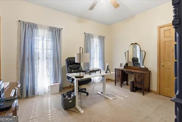 a white toilet sitting next to a shower curtain