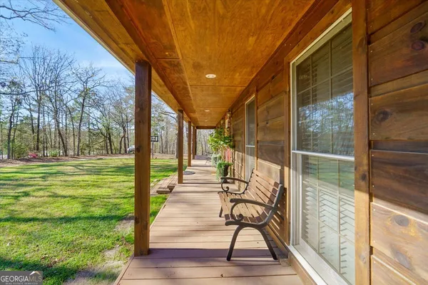 a kitchen with stainless steel appliances granite countertop a stove sink and cabinets
