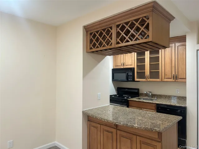 a kitchen with a stove and a microwave