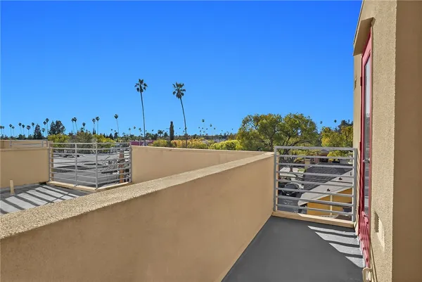 a view of a balcony with an outdoor space