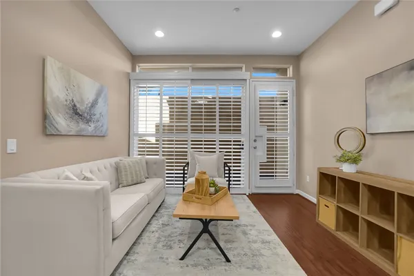 a view of livingroom with furniture and windows