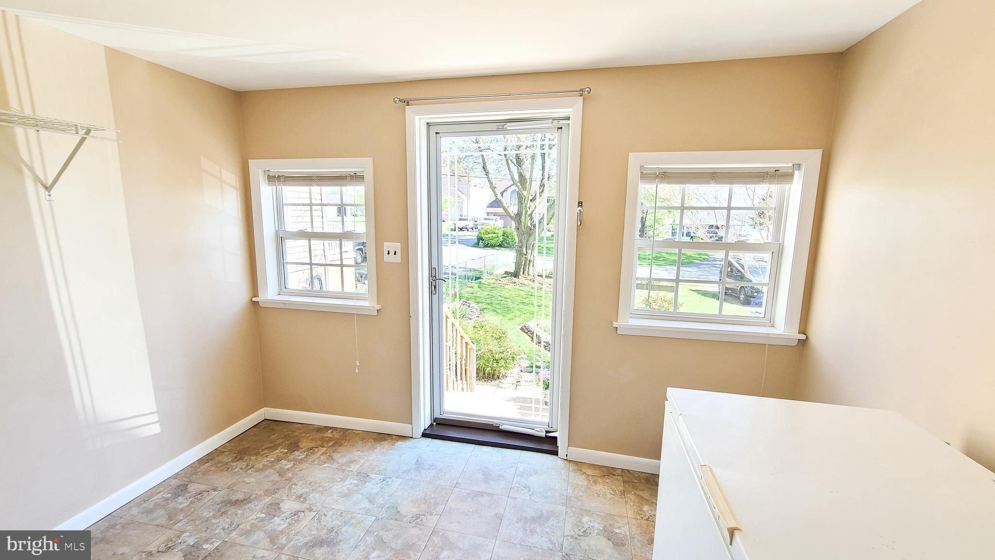 Perfectly sunny enclosed porch.