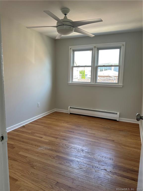 280 Lighthouse Road New Haven, CT 06512 - Photo 14 of 21 wooden floor in an empty room with a window