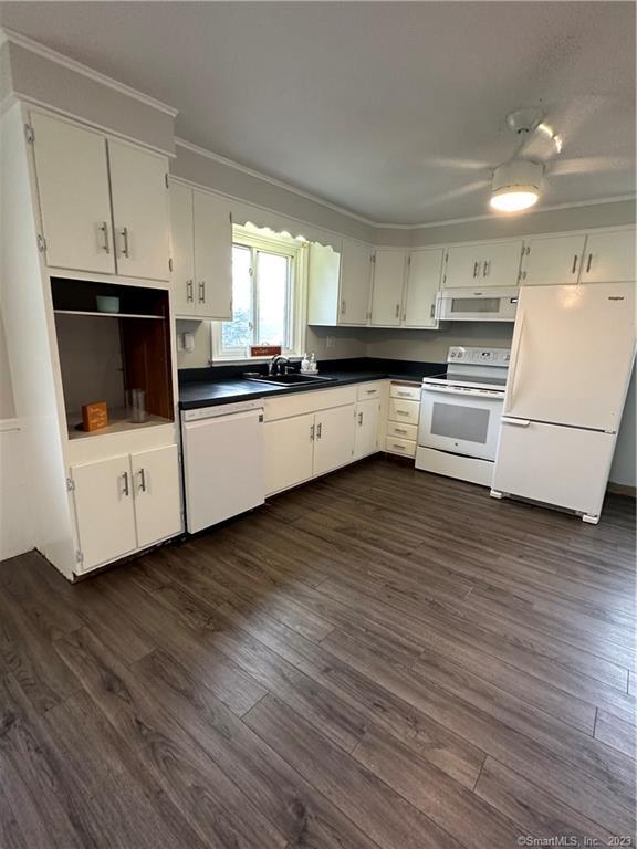 280 Lighthouse Road New Haven, CT 06512 - Photo 7 of 21 a kitchen with stainless steel appliances a refrigerator sink and microwave