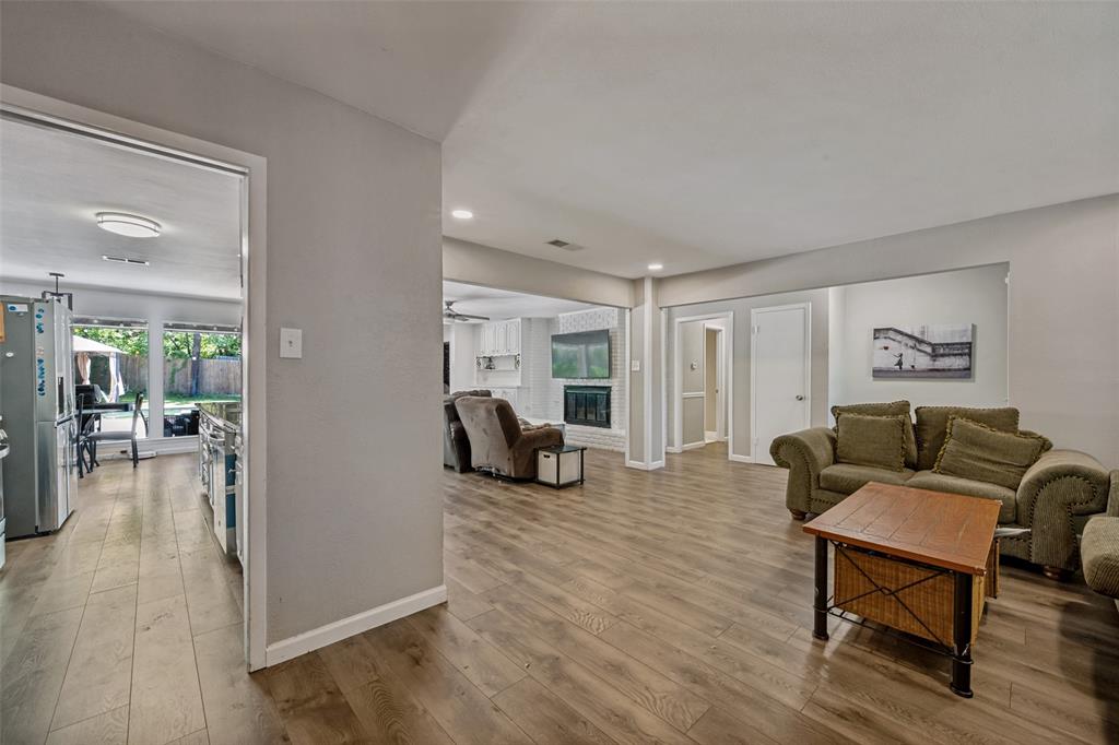 625 Caduceus Lane Hurst, TX 76053 - Photo 3 of 21 a living room with furniture and a wooden floor