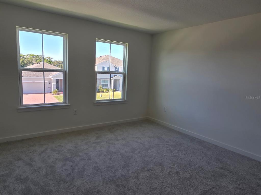 2047 Iorio Street St. Cloud, FL 34771 - Photo 11 of 17 an empty room with a window