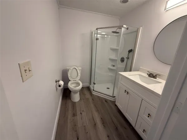 a view of bathroom with a sink and mirror