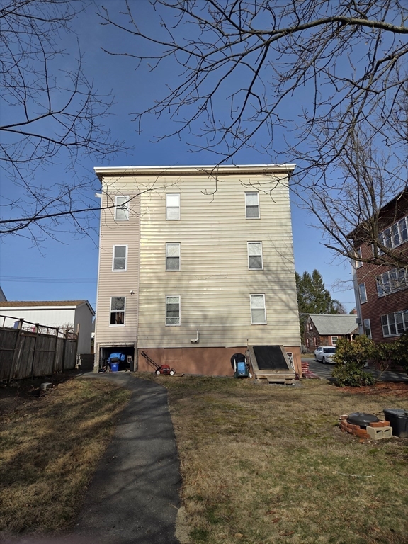 333 Oak Hill Road, Unit 2R Fitchburg, MA 01420 - Photo 11 of 12 a view of a back yard