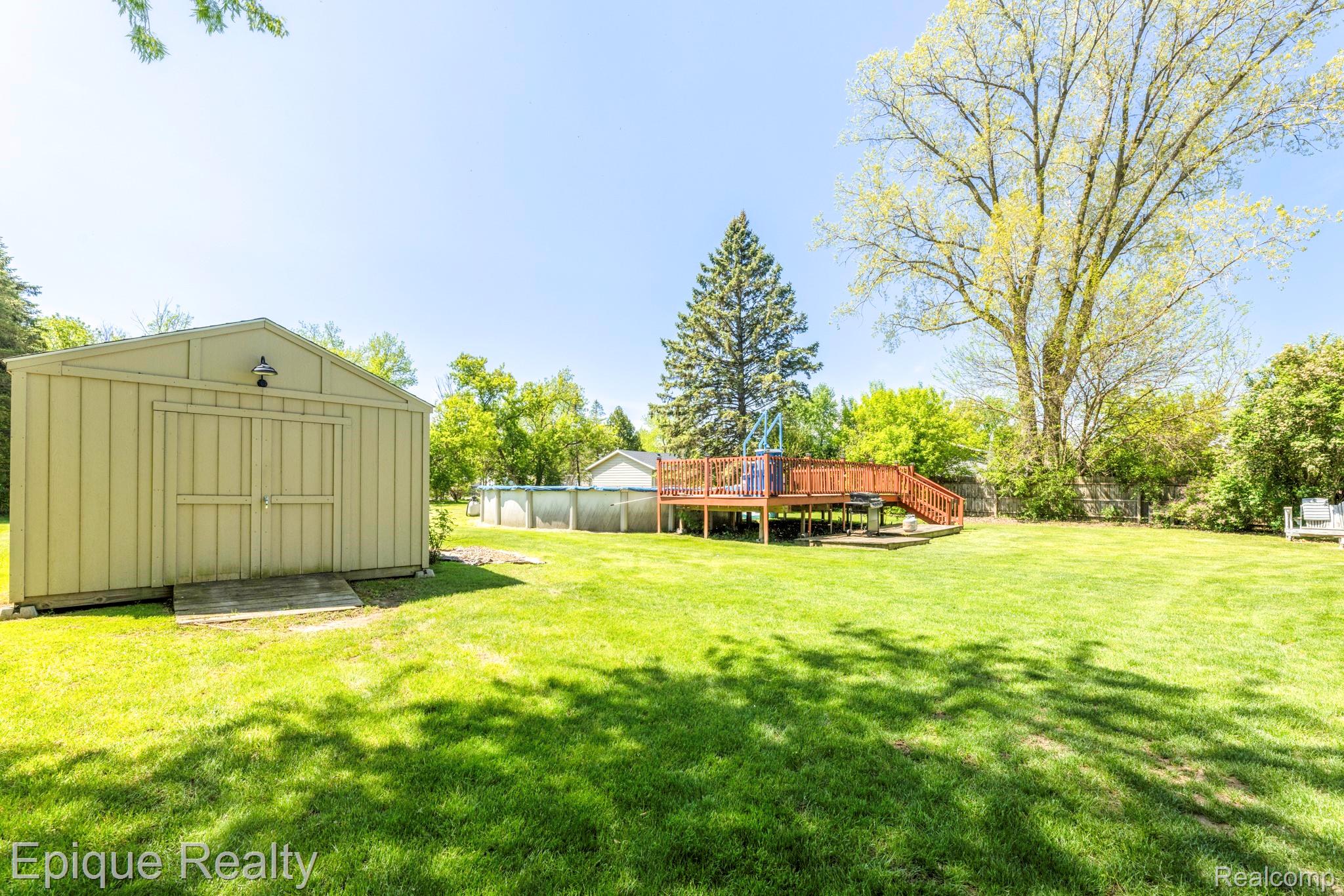 11110 Davison Road Davison, MI 48423 - Photo 53 of 65 View of yard with a shed and a deck