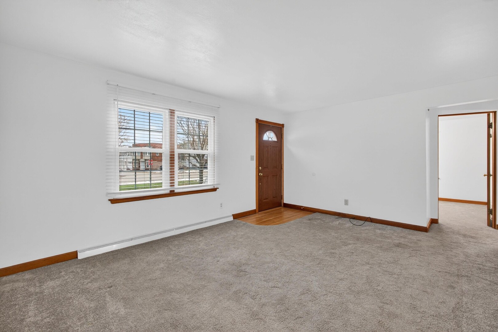 502-504 48th Street Moline, IL 61265 - Photo 8 of 31 an empty room with windows