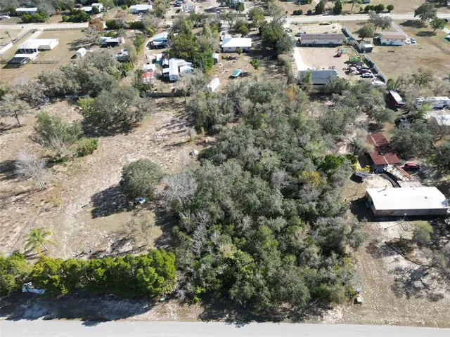 an aerial view of residential house with outdoor space