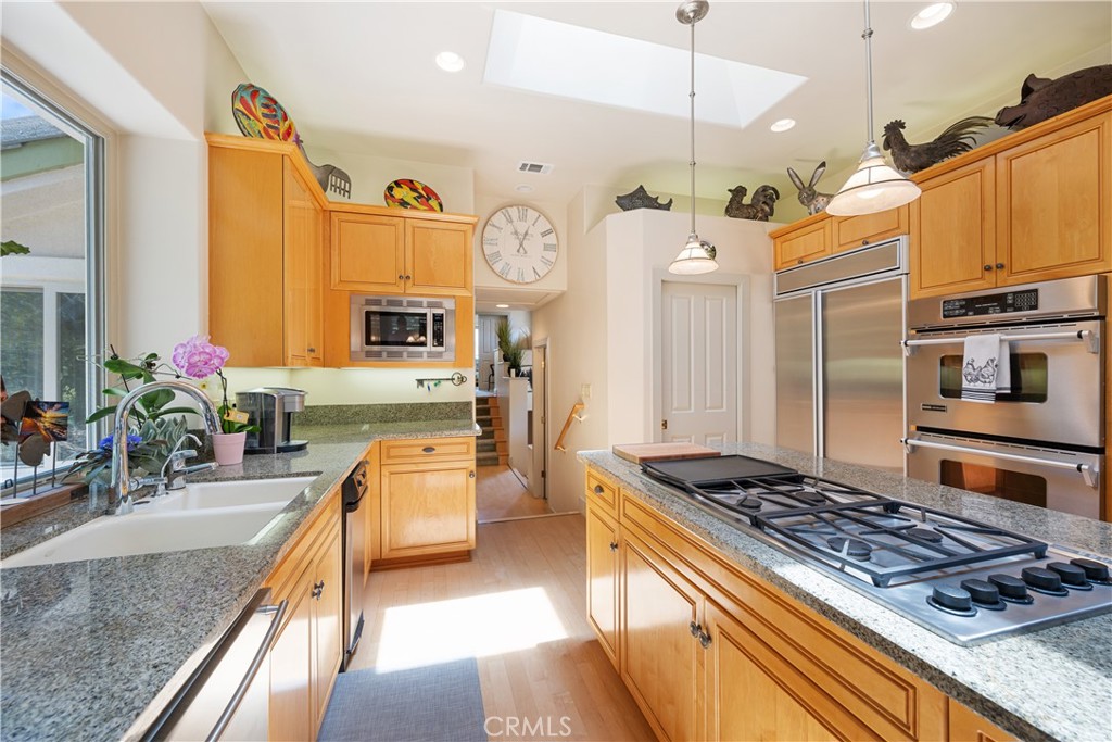 149 Andre Drive Arroyo Grande, CA 93420 - Photo 14 of 67 a kitchen with stove and refrigerator