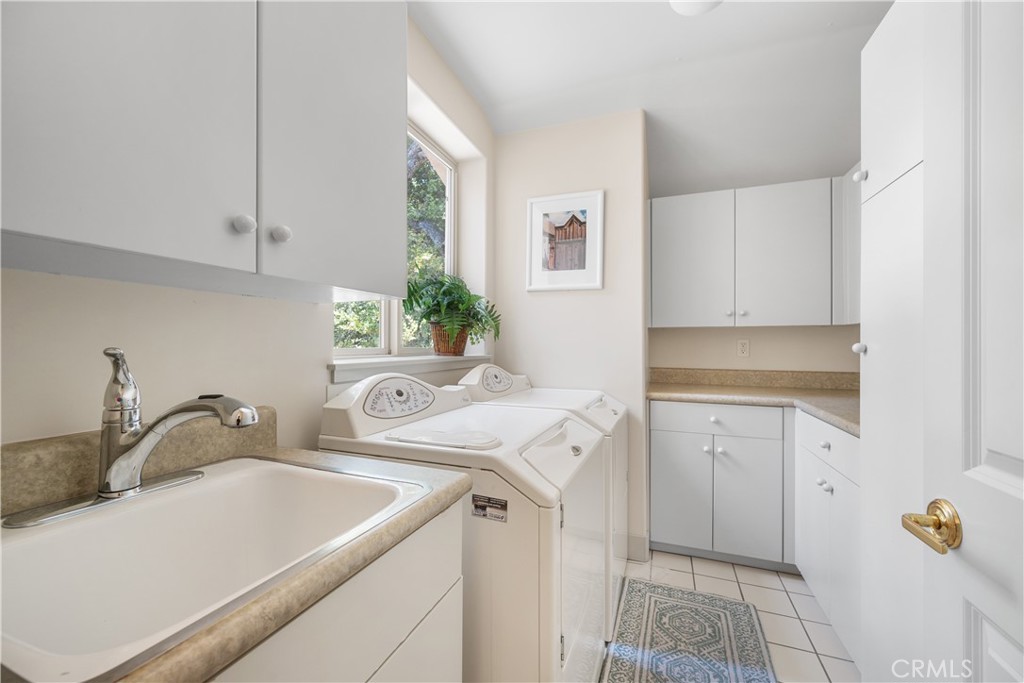149 Andre Drive Arroyo Grande, CA 93420 - Photo 21 of 67 a kitchen with a sink and cabinets