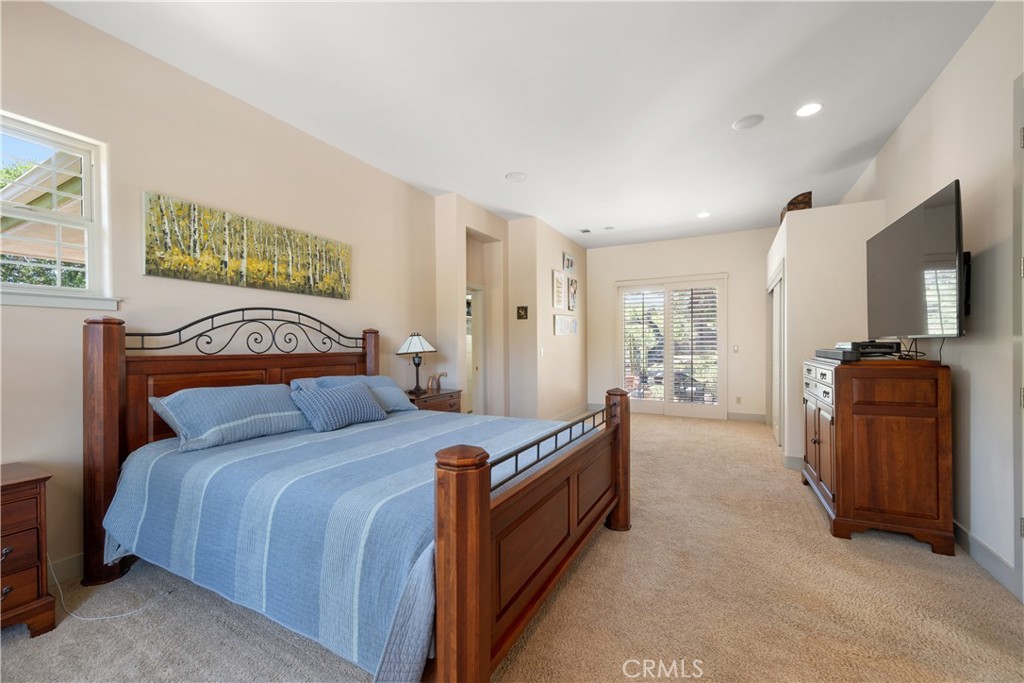 149 Andre Drive Arroyo Grande, CA 93420 - Photo 28 of 67 a bed room with a bed and a television
