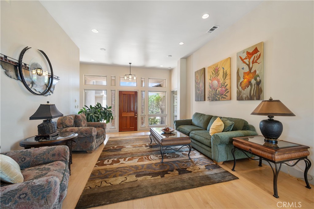 149 Andre Drive Arroyo Grande, CA 93420 - Photo 10 of 67 a living room with furniture a rug and a floor to ceiling window