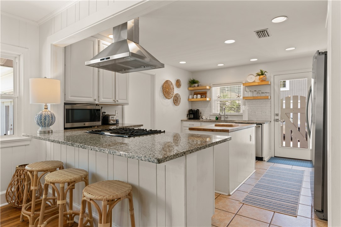 4210 7th Street St. Simons Island, GA 31522 - Photo 13 of 44 Kitchen open to dining