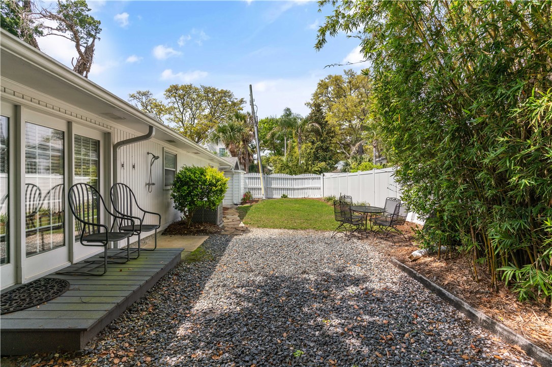4210 7th Street St. Simons Island, GA 31522 - Photo 31 of 44 Back house with parking and green space