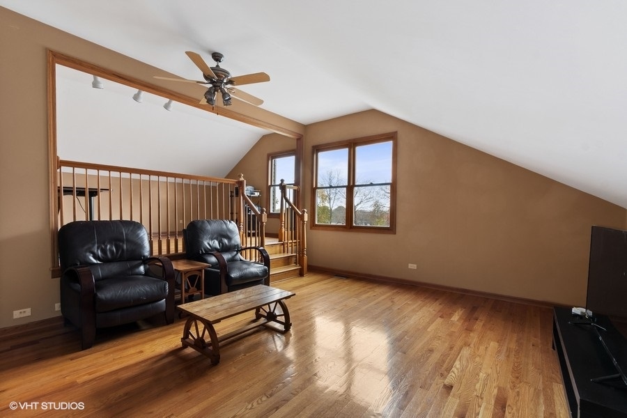 517 Ekman Drive Batavia, IL 60510 - Photo 16 of 22 a living room with furniture and a window