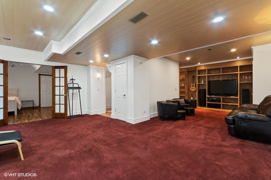 517 Ekman Drive Batavia, IL 60510 - Photo 17 of 22 a large room with furniture and a large window