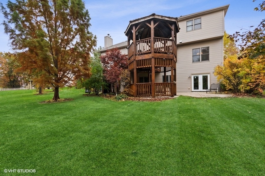 517 Ekman Drive Batavia, IL 60510 - Photo 21 of 22 a front view of a house with a garden