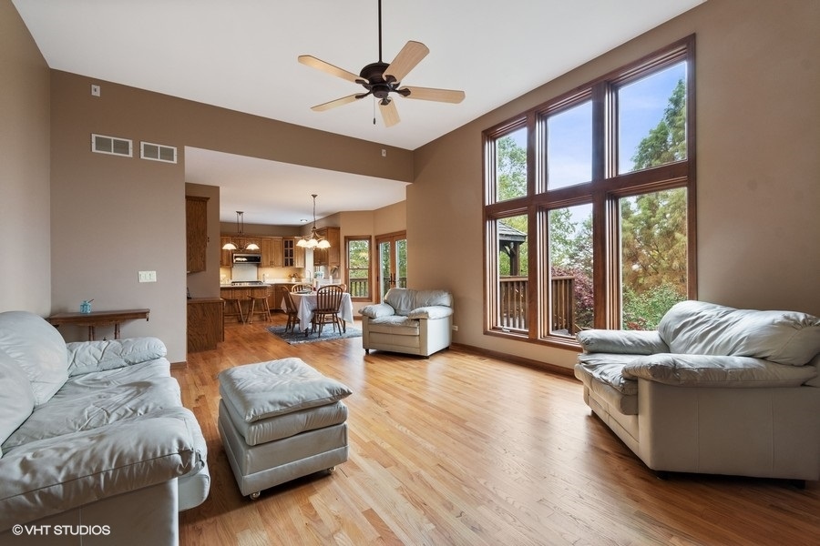 517 Ekman Drive Batavia, IL 60510 - Photo 8 of 22 a living room with furniture and a large window