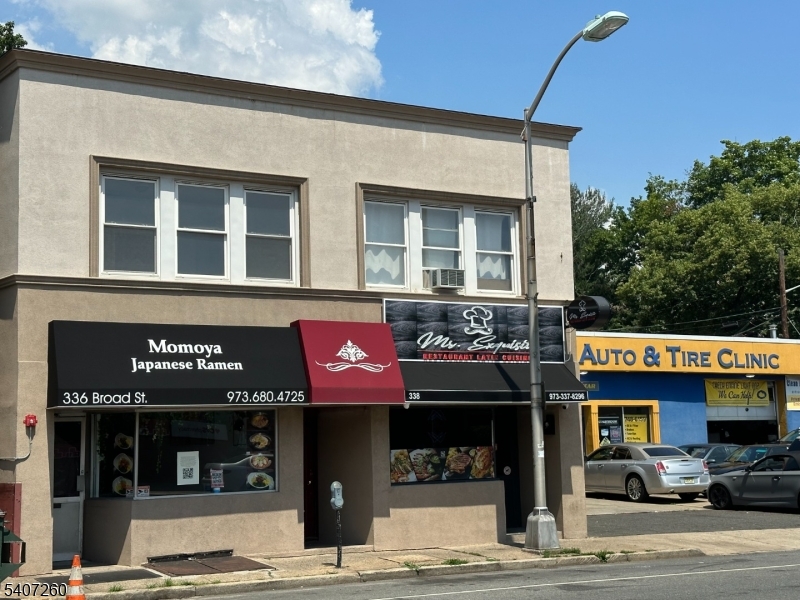 336 Broad Street, Unit 2 Bloomfield, NJ 07003 - Photo 1 of 24 a front view of multi story building with retail shops