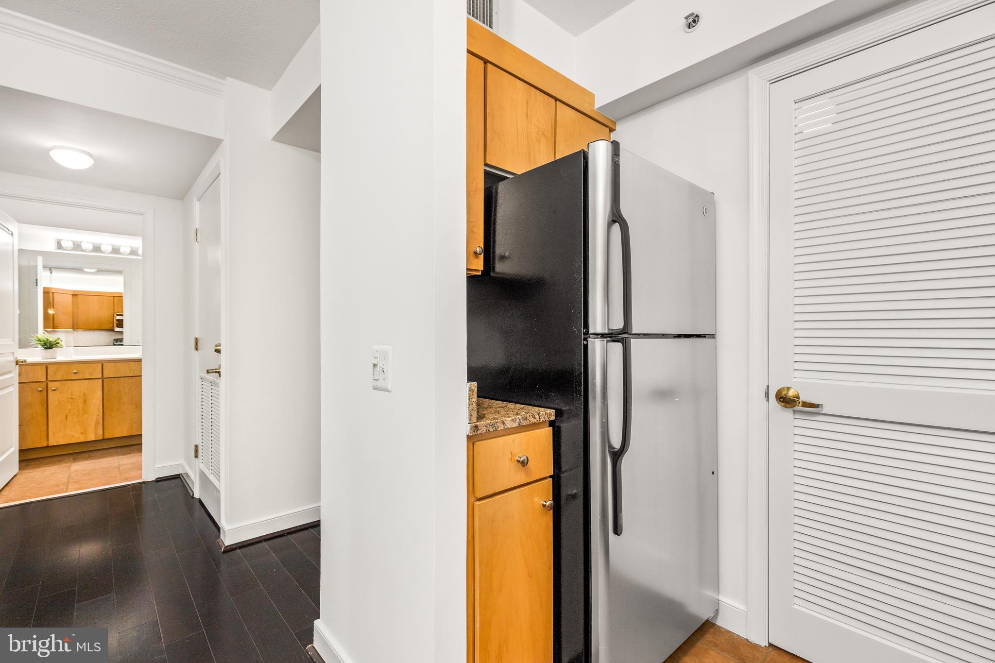 616 E Street Northwest, Unit 322 Washington, DC 20004 - Photo 11 of 33 a bathroom with a shower and a sink