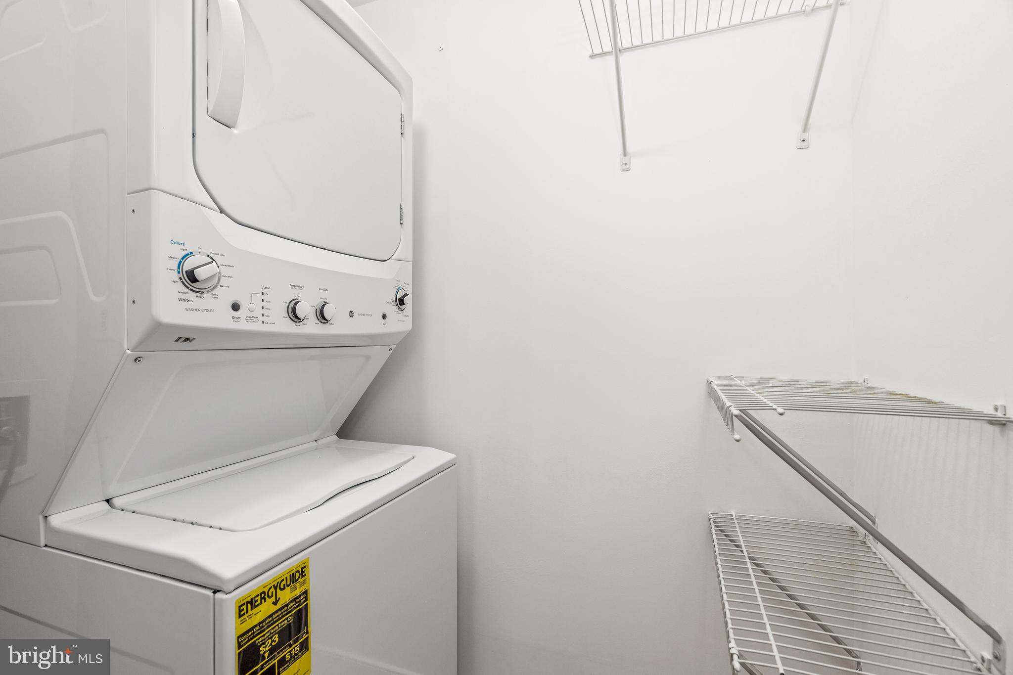 616 E Street Northwest, Unit 322 Washington, DC 20004 - Photo 13 of 33 a utility room with dryer and washer