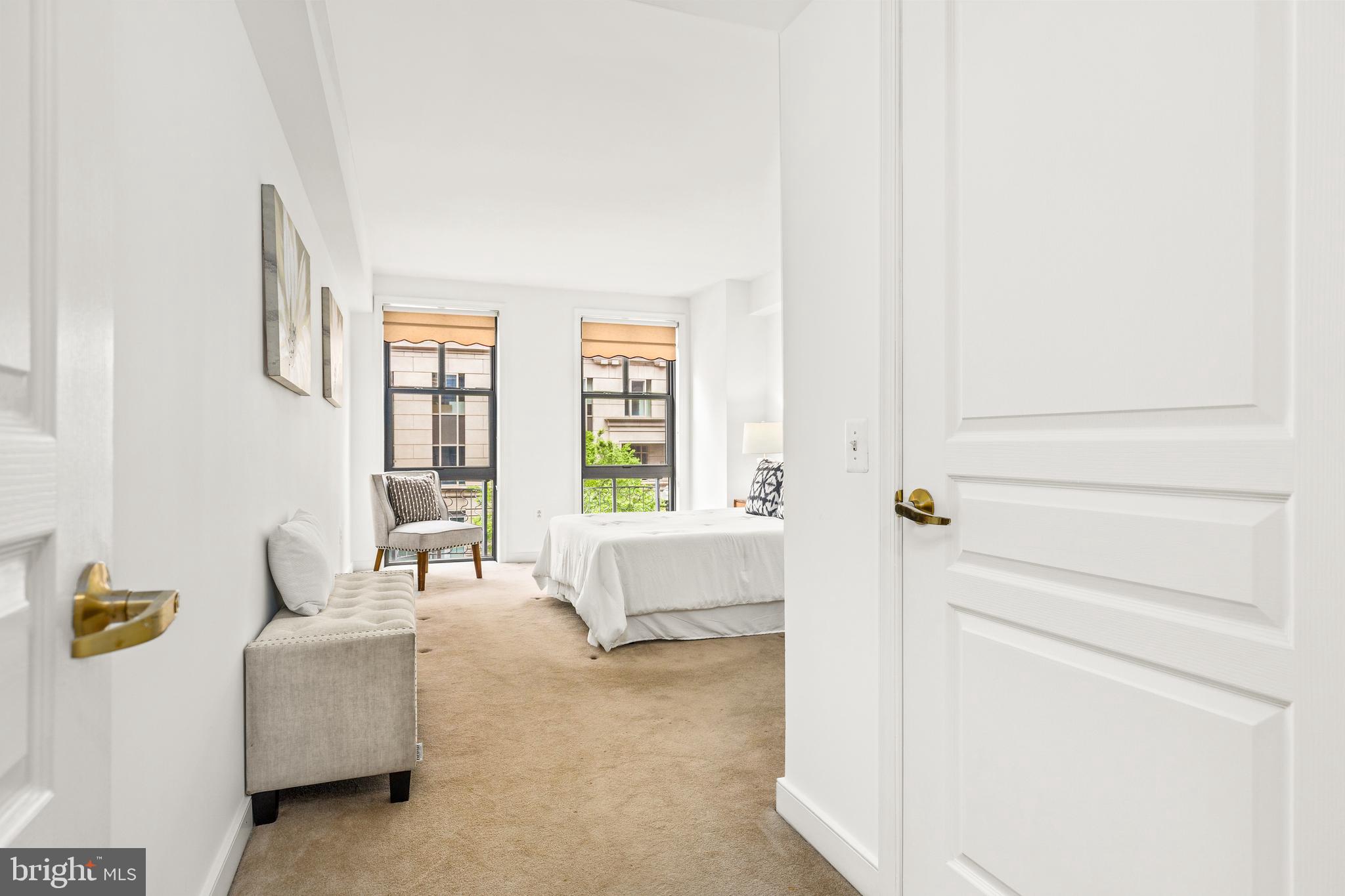 616 E Street Northwest, Unit 322 Washington, DC 20004 - Photo 16 of 33 a living room with furniture and a window