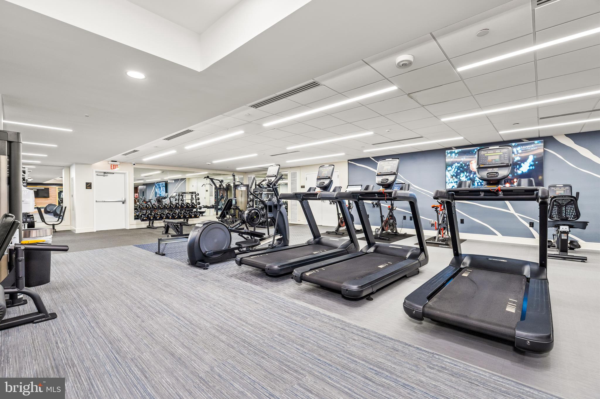 616 E Street Northwest, Unit 322 Washington, DC 20004 - Photo 27 of 33 a view of a room with gym equipment