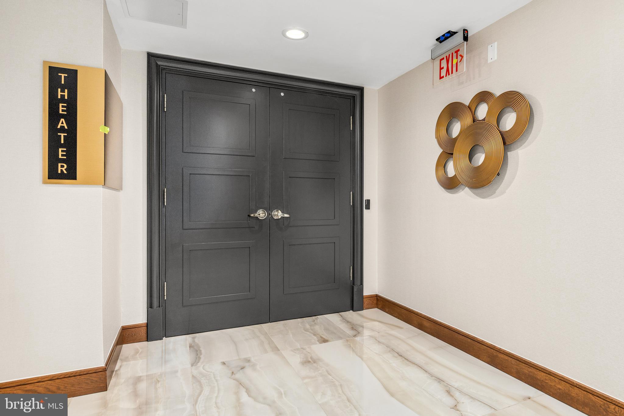 616 E Street Northwest, Unit 322 Washington, DC 20004 - Photo 29 of 33 a bathroom with a shower and mirror