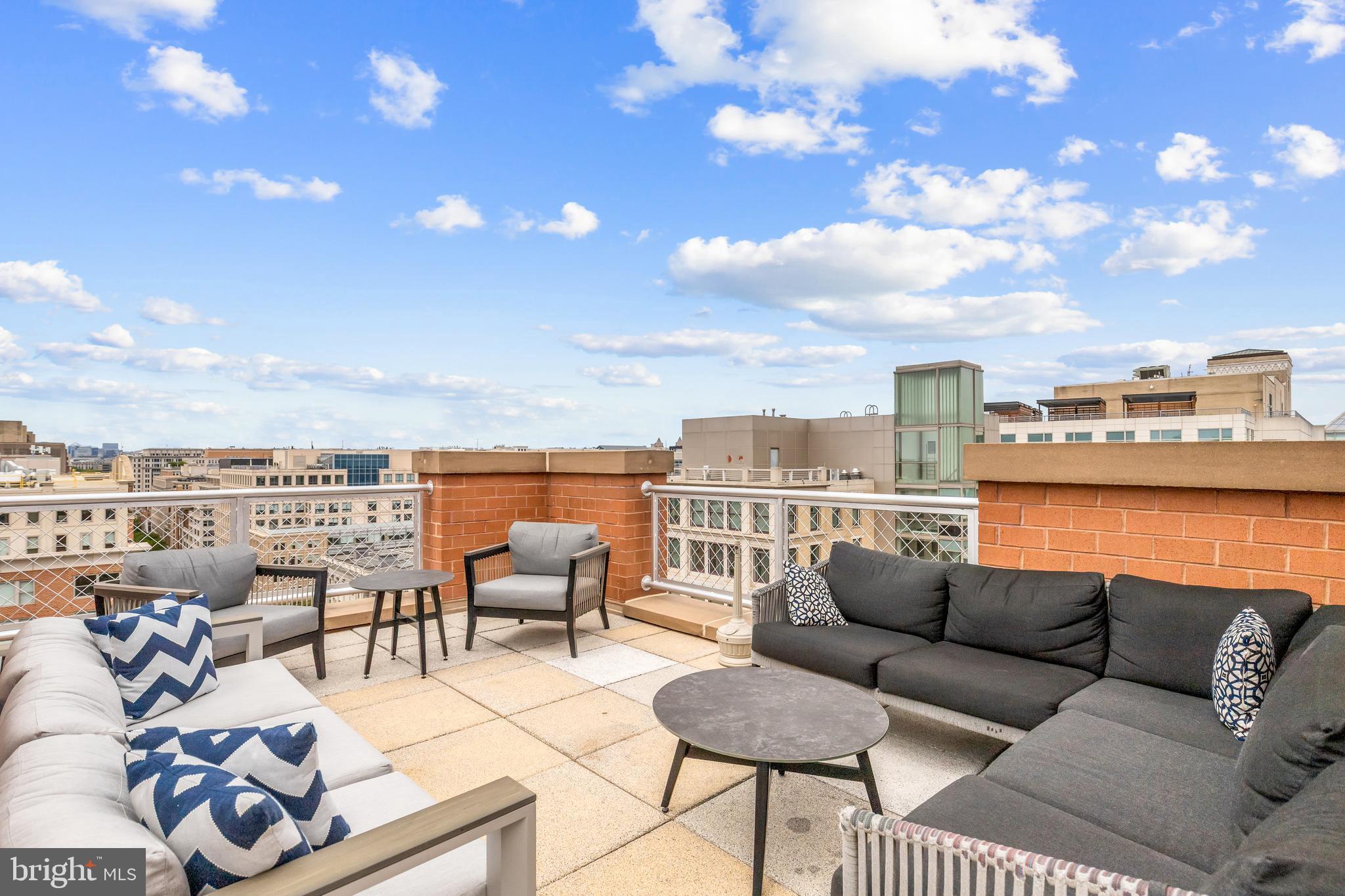 616 E Street Northwest, Unit 322 Washington, DC 20004 - Photo 31 of 33 a view of a terrace with furniture