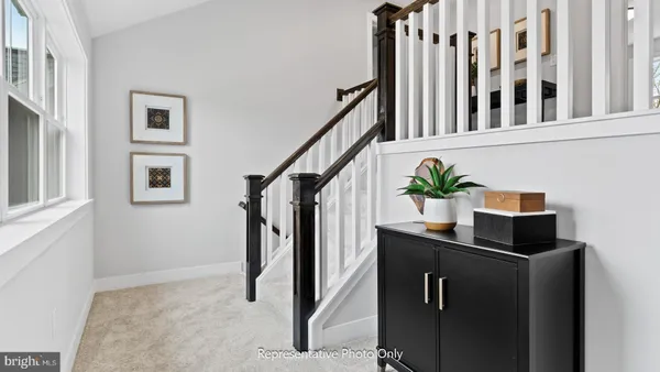 a view of staircase with lots of white walls