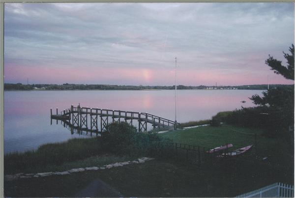 17 Baron Road Barrington, RI 02806 - Photo 2 of 9 a view of a lake from a yard