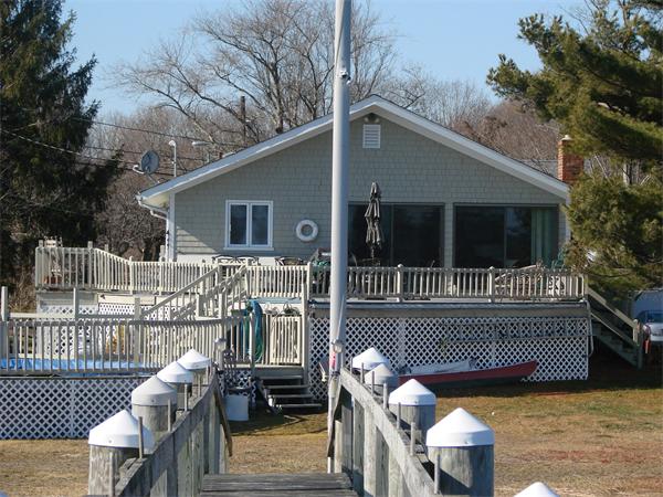 17 Baron Road Barrington, RI 02806 - Photo 8 of 9 a view of a house with a deck and a patio