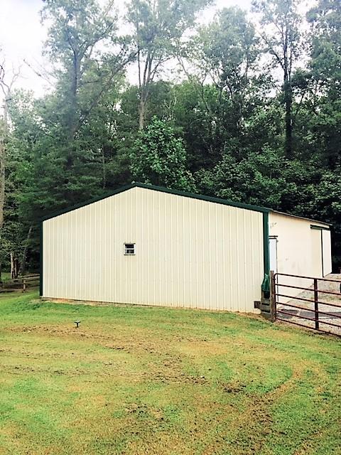 48 L Mitchell Road Kelso, TN 37348 - Photo 13 of 27 a view of a backyard