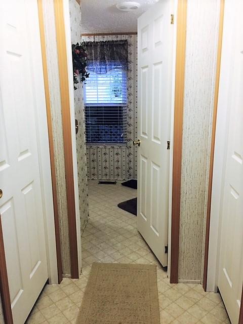 48 L Mitchell Road Kelso, TN 37348 - Photo 20 of 27 a bathroom with a sink and mirror