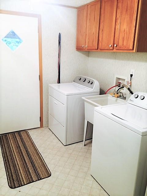 48 L Mitchell Road Kelso, TN 37348 - Photo 21 of 27 a utility room with dryer and washer