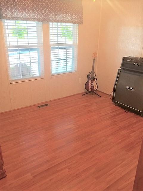48 L Mitchell Road Kelso, TN 37348 - Photo 27 of 27 a view of a room with wooden floor and windows