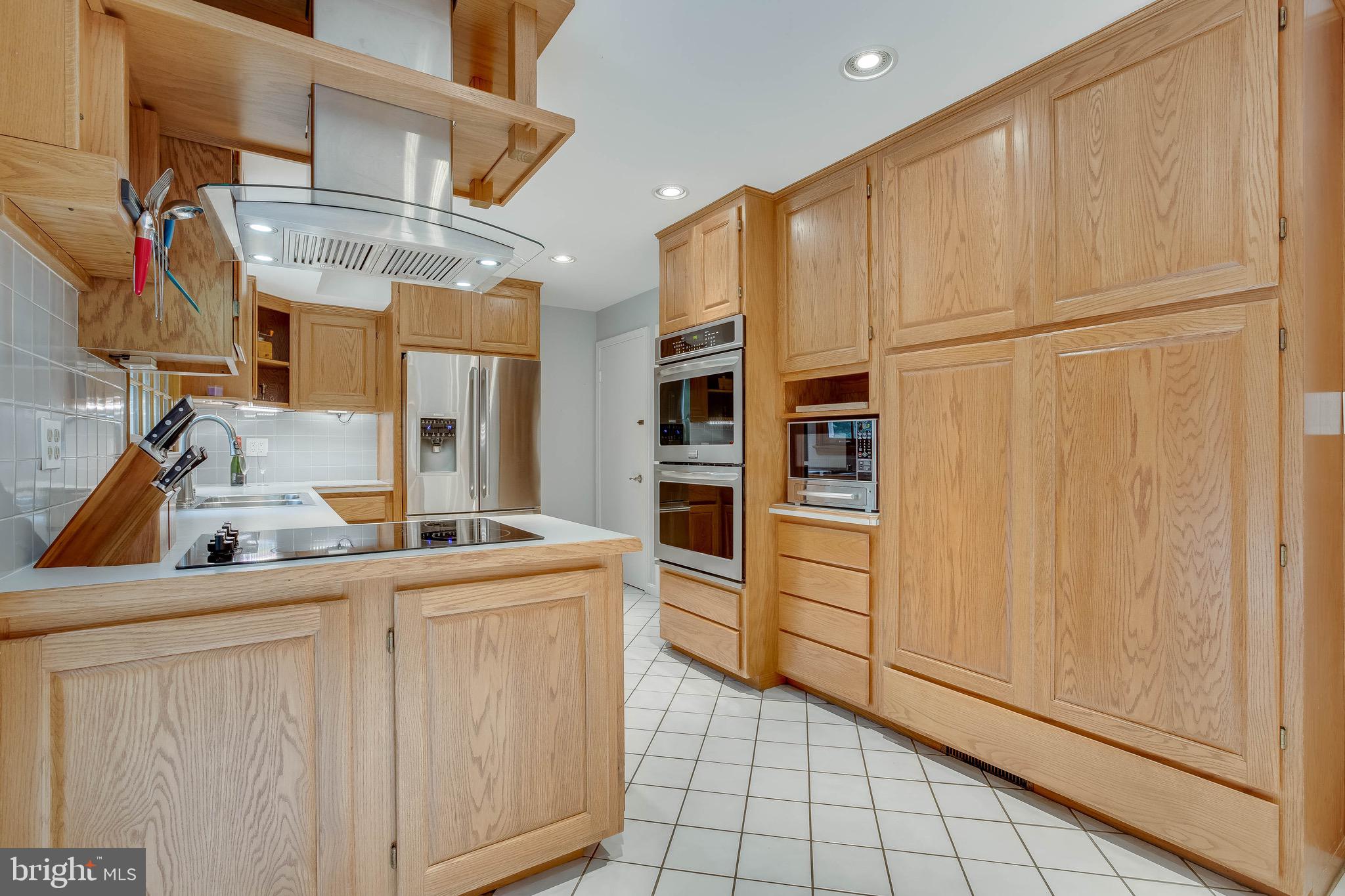 6907 Huntsman Boulevard Springfield, VA 22153 - Photo 12 of 48 Costume Design Kitchen-Stainless Steel Appliances