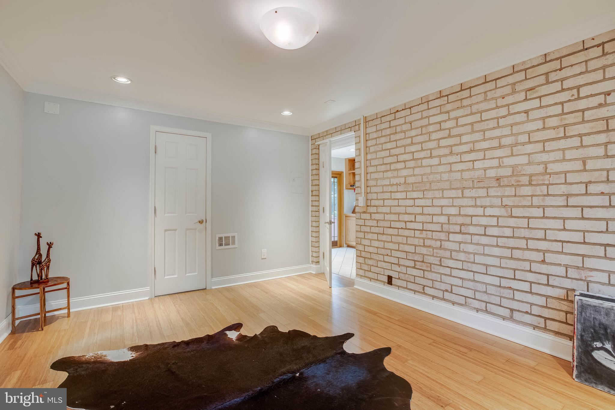 6907 Huntsman Boulevard Springfield, VA 22153 - Photo 17 of 48 Master Bedroom/Family Room Main Level