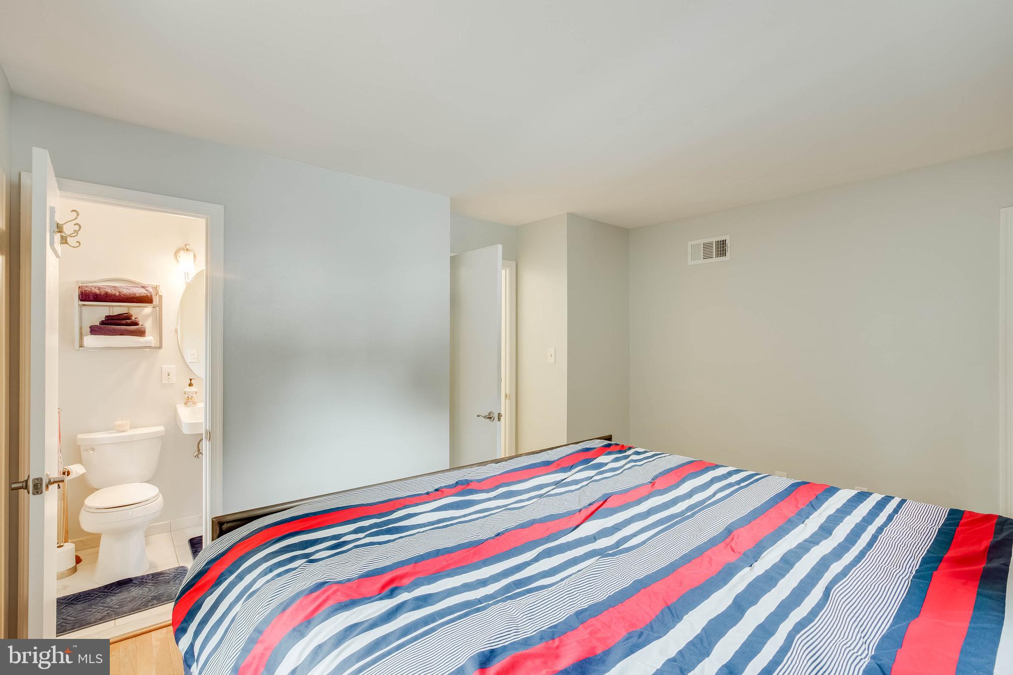 6907 Huntsman Boulevard Springfield, VA 22153 - Photo 24 of 48 Master Bedroom Upper Level