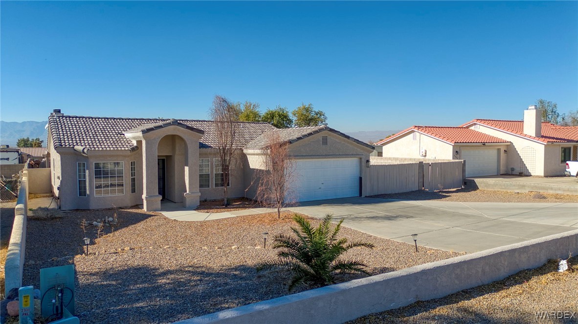 2331 Primavera Loop Fort Mohave, AZ 86426 - Photo 1 of 63 Front of Structure