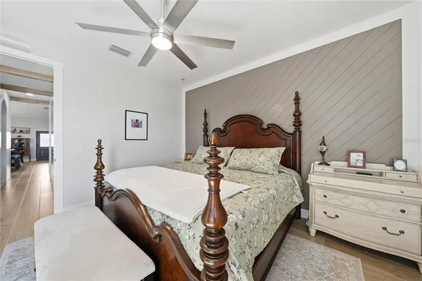 a bedroom with a bed and a cabinets