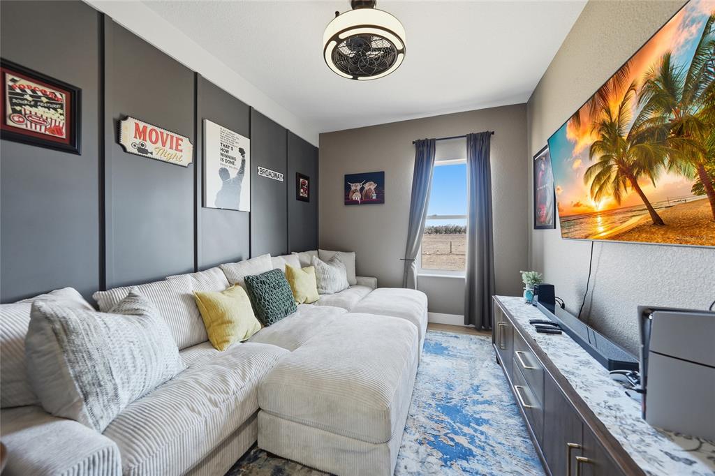 2481 Northeast Faye Terrace Arcadia, FL 34266 - Photo 31 of 57 a bedroom with a bed and a couch