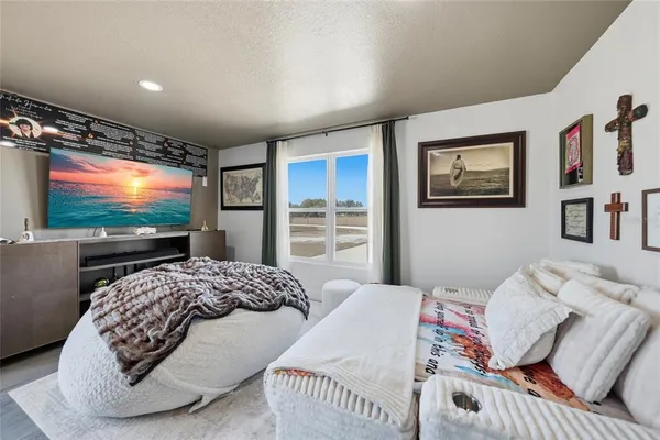 a work room with furniture and window